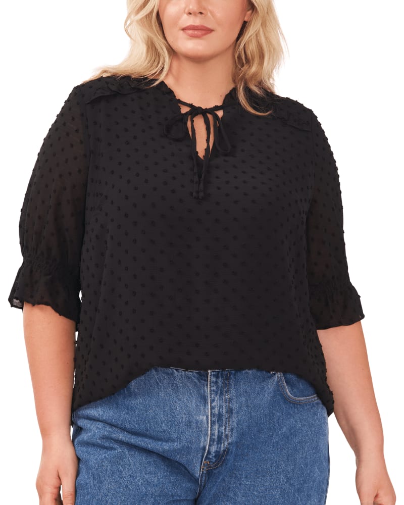 Front of a model wearing a size 1X Kayla Clip Dot Chiffon Blouse in RICH BLACK by CeCe. | dia_product_style_image_id:263944
